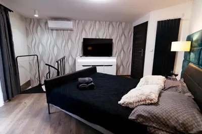 Łóżko lub łóżka w pokoju w obiekcie Spadzista 1