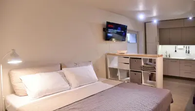 Łóżko lub łóżka w pokoju w obiekcie Apartamenty Sjesta River blisko centrum, prywatny parking, dodatkowy bezplatny parking w centrum miasta