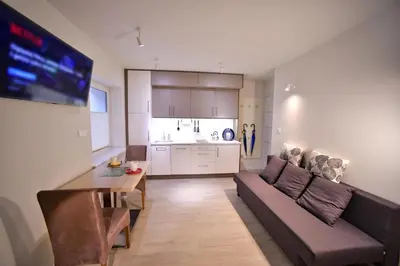 Część wypoczynkowa w obiekcie Apartamenty Sjesta River blisko centrum, prywatny parking, dodatkowy bezplatny parking w centrum miasta