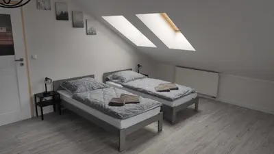Łóżko lub łóżka w pokoju w obiekcie Apart Hotel 38 (95m2)