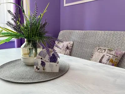 Łóżko lub łóżka w pokoju w obiekcie Apartament Lawendowy