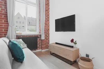 Telewizja i/lub zestaw kina domowego w obiekcie Right in the heart of Wroclaw