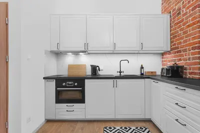 Kuchnia lub aneks kuchenny w obiekcie Grey Panther Apartment in the Heart of Wroclaw