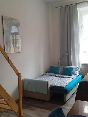 Łóżko lub łóżka w pokoju w obiekcie ARLA Studio