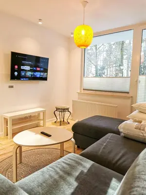 Część wypoczynkowa w obiekcie Apartament Okna na Park