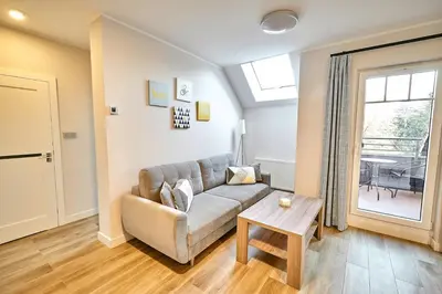 Część wypoczynkowa w obiekcie Apartament 26A Willa Ogrodowa