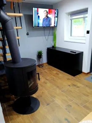 Telewizja i/lub zestaw kina domowego w obiekcie SunSet Radków