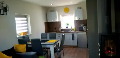 Kuchnia lub aneks kuchenny w obiekcie SunSet Radków