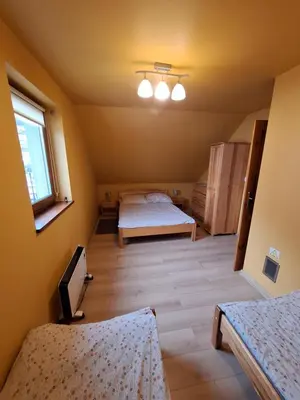 Łóżko lub łóżka w pokoju w obiekcie Górskie Zacisze Kamienica