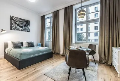 Łóżko lub łóżka w pokoju w obiekcie Rent like home - Księcia Józefa Poniatowskiego 2