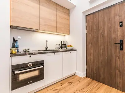 Kuchnia lub aneks kuchenny w obiekcie Rent like home - Księcia Józefa Poniatowskiego 2