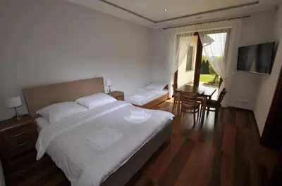 Łóżko lub łóżka w pokoju w obiekcie Apartamenty Sowiogórskie