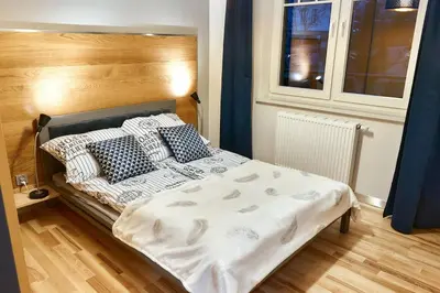 Łóżko lub łóżka w pokoju w obiekcie LAGUNA Apartament 7 Willa Maria