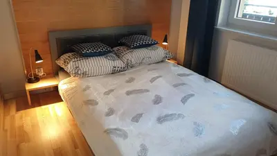 Łóżko lub łóżka w pokoju w obiekcie LAGUNA Apartament 7 Willa Maria