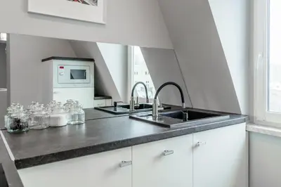 Kuchnia lub aneks kuchenny w obiekcie Nowoczesny apartament Gliwice - 200 metrów od rynku