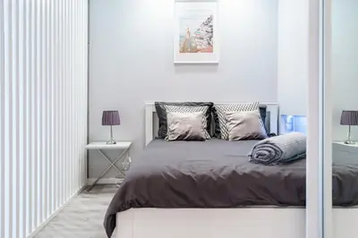 Łóżko lub łóżka w pokoju w obiekcie Nowoczesny apartament Gliwice - 200 metrów od rynku