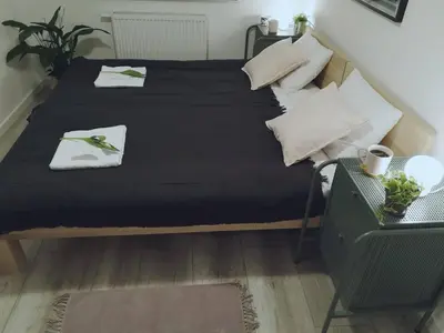 Łóżko lub łóżka w pokoju w obiekcie Apartament Wrzosowa 25