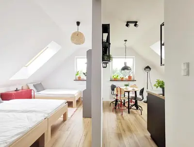 Łóżko lub łóżka w pokoju w obiekcie Apartament Wrzosowa 25
