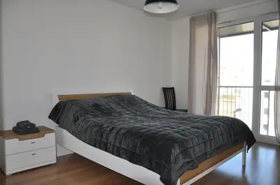 Łóżko lub łóżka w pokoju w obiekcie WROCLOVE_NET APARTMENTS