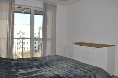 Łóżko lub łóżka w pokoju w obiekcie WROCLOVE_NET APARTMENTS
