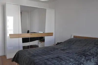 Łóżko lub łóżka w pokoju w obiekcie WROCLOVE_NET APARTMENTS