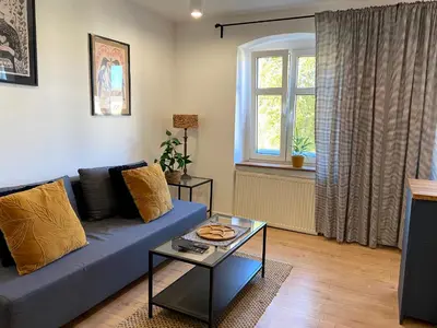 Część wypoczynkowa w obiekcie Lemuria Apartament Szkolna centrum