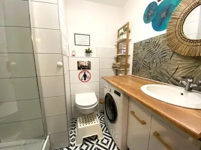 Łazienka w obiekcie Lemuria Apartament Szkolna centrum