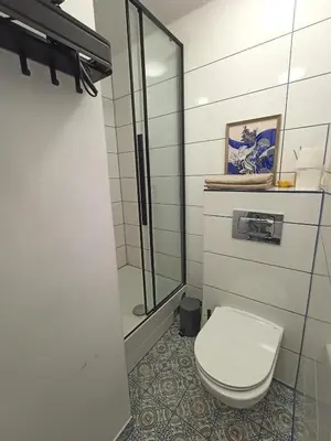 Łazienka w obiekcie Lemuria Pokój z łazienką Szkolna