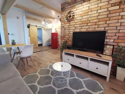Telewizja i/lub zestaw kina domowego w obiekcie Apartament ALPa Kudowa Zdrój