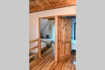 Łóżko lub łóżka w pokoju w obiekcie Nad strumykiem