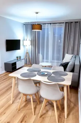 Telewizja i/lub zestaw kina domowego w obiekcie LAGUNA Apartament Polanica Residence 13 z garażem -SPA