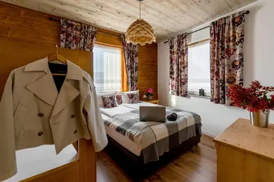 Łóżko lub łóżka w pokoju w obiekcie APARTAMENTY U HARREGO BOUTIQUE SPA masaże, sauna, tężnia solankowa , balkon , taras , klimatyzacja , parking