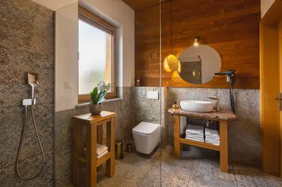 Łazienka w obiekcie APARTAMENTY U HARREGO BOUTIQUE SPA masaże, sauna, tężnia solankowa , balkon , taras , klimatyzacja , parking