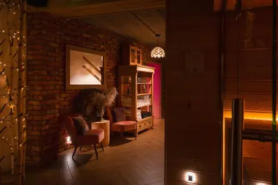 Część wypoczynkowa w obiekcie APARTAMENTY U HARREGO BOUTIQUE SPA masaże, sauna, tężnia solankowa , balkon , taras , klimatyzacja , parking