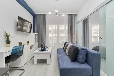 Telewizja i/lub zestaw kina domowego w obiekcie Modern Apartments Kościuszki with FREE GARAGE Wrocław by Noclegi Renters