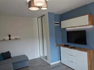 Telewizja i/lub zestaw kina domowego w obiekcie Apartament Na Wzgórzu