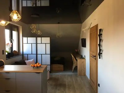 Telewizja i/lub zestaw kina domowego w obiekcie Apartament nad Jeziorem Nyskim
