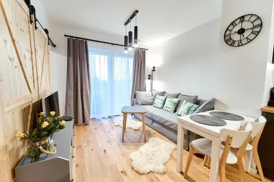 Telewizja i/lub zestaw kina domowego w obiekcie LAGUNA Apartament Polanica Residence 32