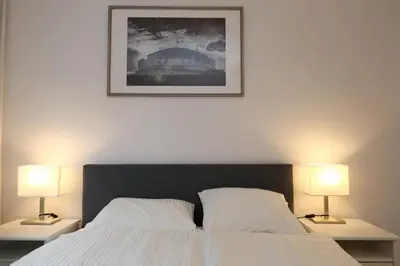 Łóżko lub łóżka w pokoju w obiekcie KDRO Apartment Szewska Rynek
