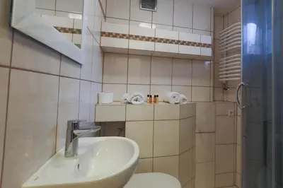 Łazienka w obiekcie KDRO Apartment Szewska Rynek