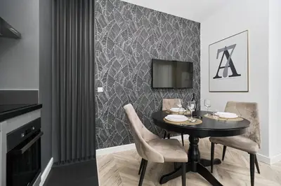Część wypoczynkowa w obiekcie Apartments Wrocław Aleja Architektów by Noclegi Renters