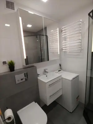 Łazienka w obiekcie Apartament Gliwice Centaura, klimatyzacja