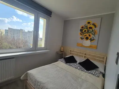 Łóżko lub łóżka w pokoju w obiekcie Apartament Gliwice Centaura, klimatyzacja