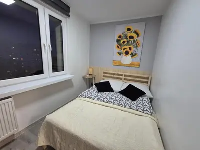 Łóżko lub łóżka w pokoju w obiekcie Apartament Gliwice Centaura, klimatyzacja