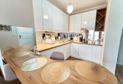 Kuchnia lub aneks kuchenny w obiekcie LAGUNA 11 Apartament z Kwiatami