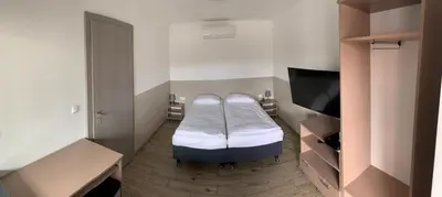 Telewizja i/lub zestaw kina domowego w obiekcie Ludowa Restauracja & Noclegi