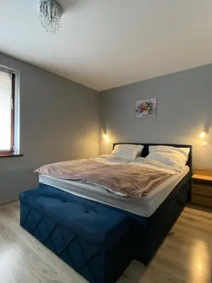 Łóżko lub łóżka w pokoju w obiekcie Apartament Artemida Kletno