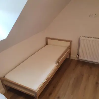 Łóżko lub łóżka w pokoju w obiekcie Domki Dzika Orlica