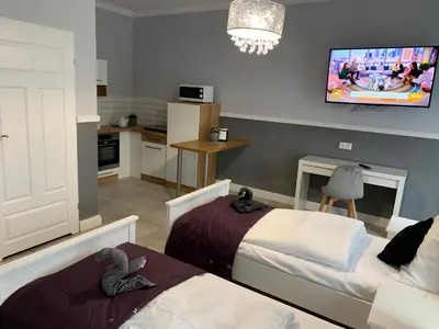 Telewizja i/lub zestaw kina domowego w obiekcie Willa Konopnicka