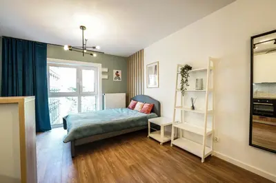 Łóżko lub łóżka w pokoju w obiekcie Dom na Kurkowej 32